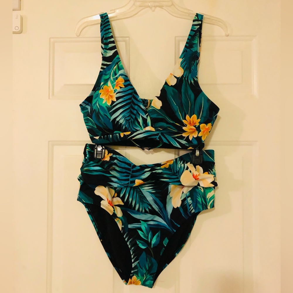 Two piece underwire bra with high top bottoms.